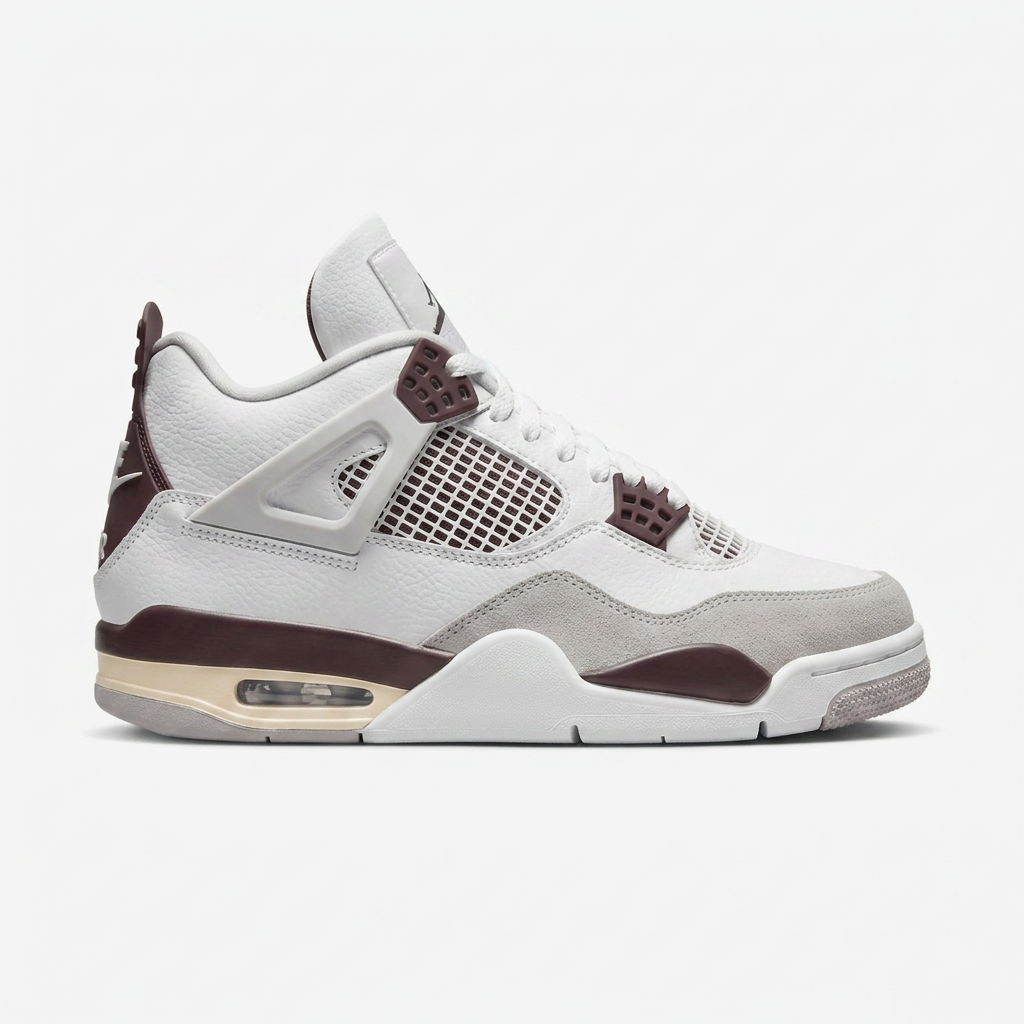 Air Jordan 4 sneaker in white leather with grey suede and mauve trim, side profile view