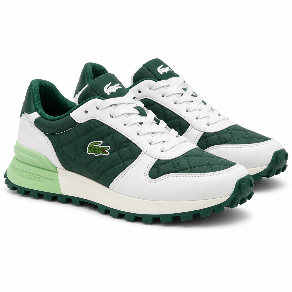 White and forest green quilted sneakers with mint heel accent on a plain white background