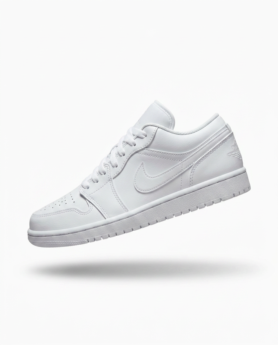 Triple white Air Jordan 1 Low leather sneaker on a plain white background
