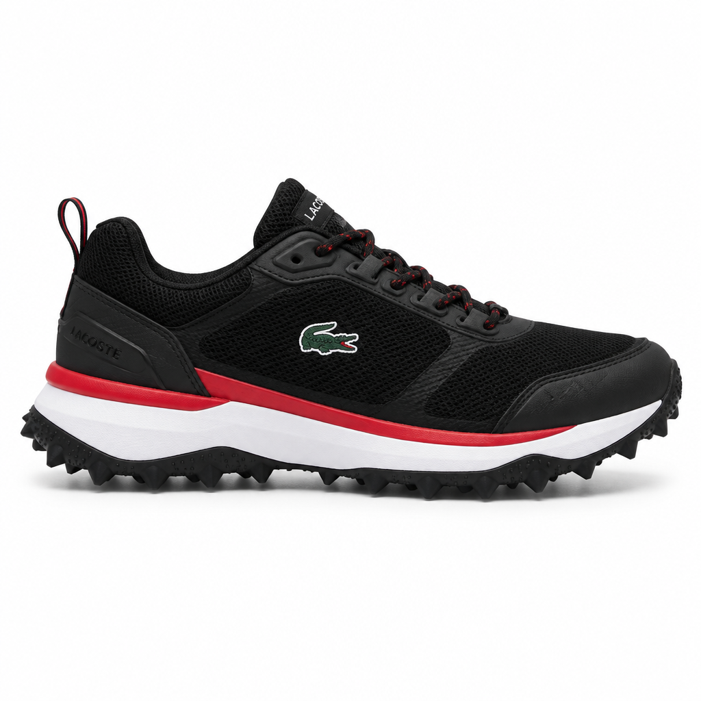 Black trail running sneaker with red midsole stripe and spiked outsole on a plain white background