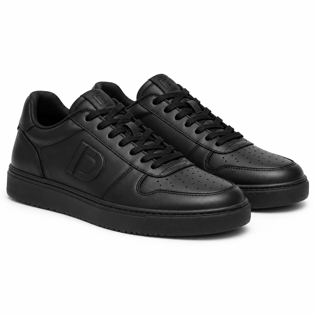 Triple black leather low-top sneakers with embossed side logo on a plain white background