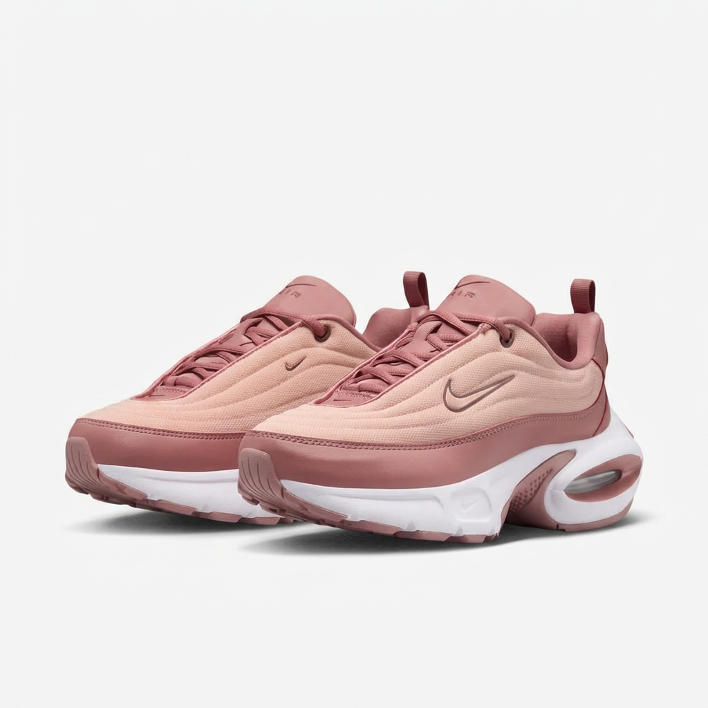 Pair of rose and peach Nike Air Max Portal sneakers on white
